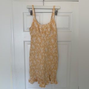 Yellow and white patterned summer dress with matching headscarf